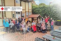 Gruppenfoto der DRK-Tagespflege Möckern beim Ausflug nach Burg, Titelbild-Version.